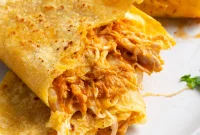 Crispy Chicken Tacos with Lime Slaw and Avocado Crema