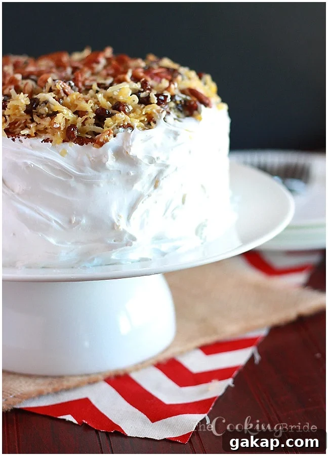 Amalgamation Cake: What It Is and How It Works in Baking 2 A forgotten Southern classic, Amalgamation cake is filled with raisins and coconut, iced with homemade frosting and garnished with more coconut and raisins.