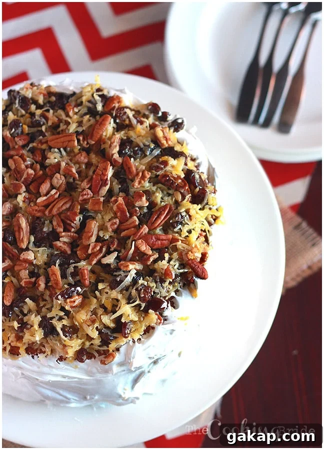 Amalgamation Cake: What It Is and How It Works in Baking 3 A forgotten Southern classic, Amalgamation cake is filled with raisins and coconut, iced with homemade frosting and garnished with more coconut and raisins.