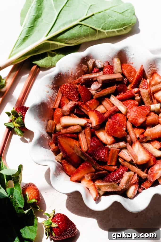 A pie dish with the fruit filling.