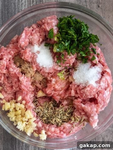 Ground pork with sausage seasonings not yet mixed in