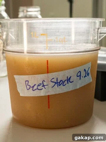 Beef stock in a container.