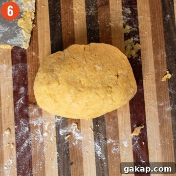 Homemade Pumpkin Gnocchi Recipe with Sage Butter 8 Dough together in a ball.