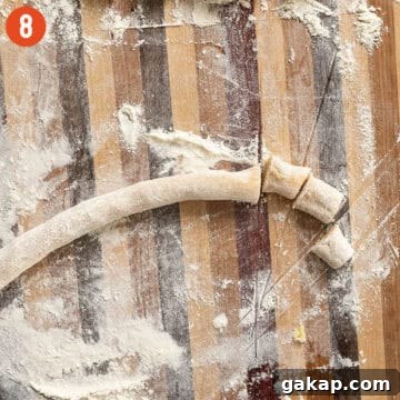 Homemade Pumpkin Gnocchi Recipe with Sage Butter 10 Rolled dough into a long thin rope.