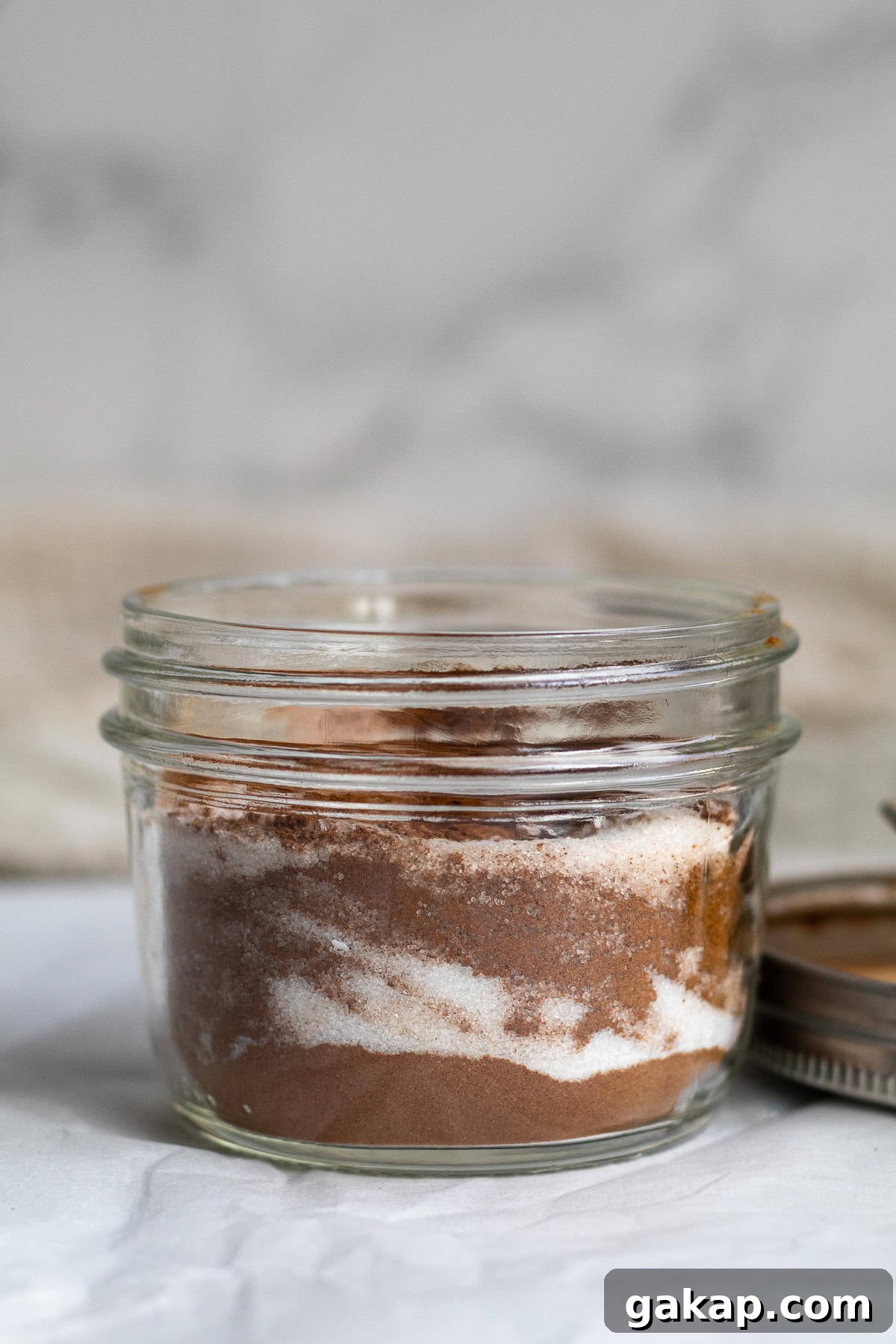 layered sugar and cinnamon in a mason jar