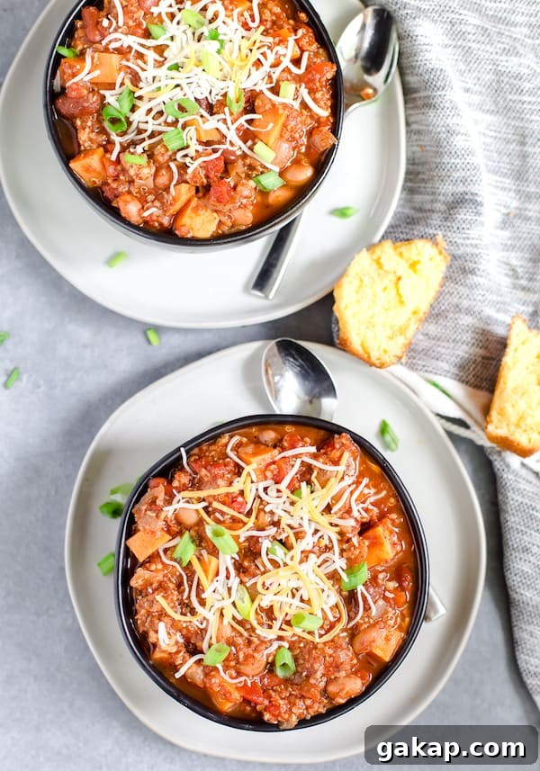 Instant Pot Turkey and Quinoa Chili Recipe 4 Instant Pot Turkey Quinoa Chili Overhead Shot of Two Bowls Served with Bread