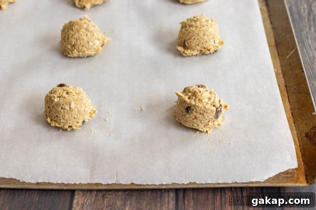 balls of dough on parchment paper