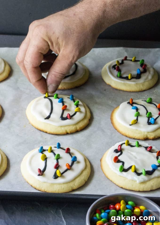 placing mnms on christmas cookies
