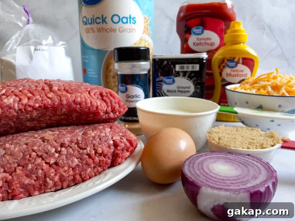 Ingredients: ground beef, onion, egg, oats, milk, salt, pepper, garlic powder, cheese, ketchup, mustard, and brown sugar