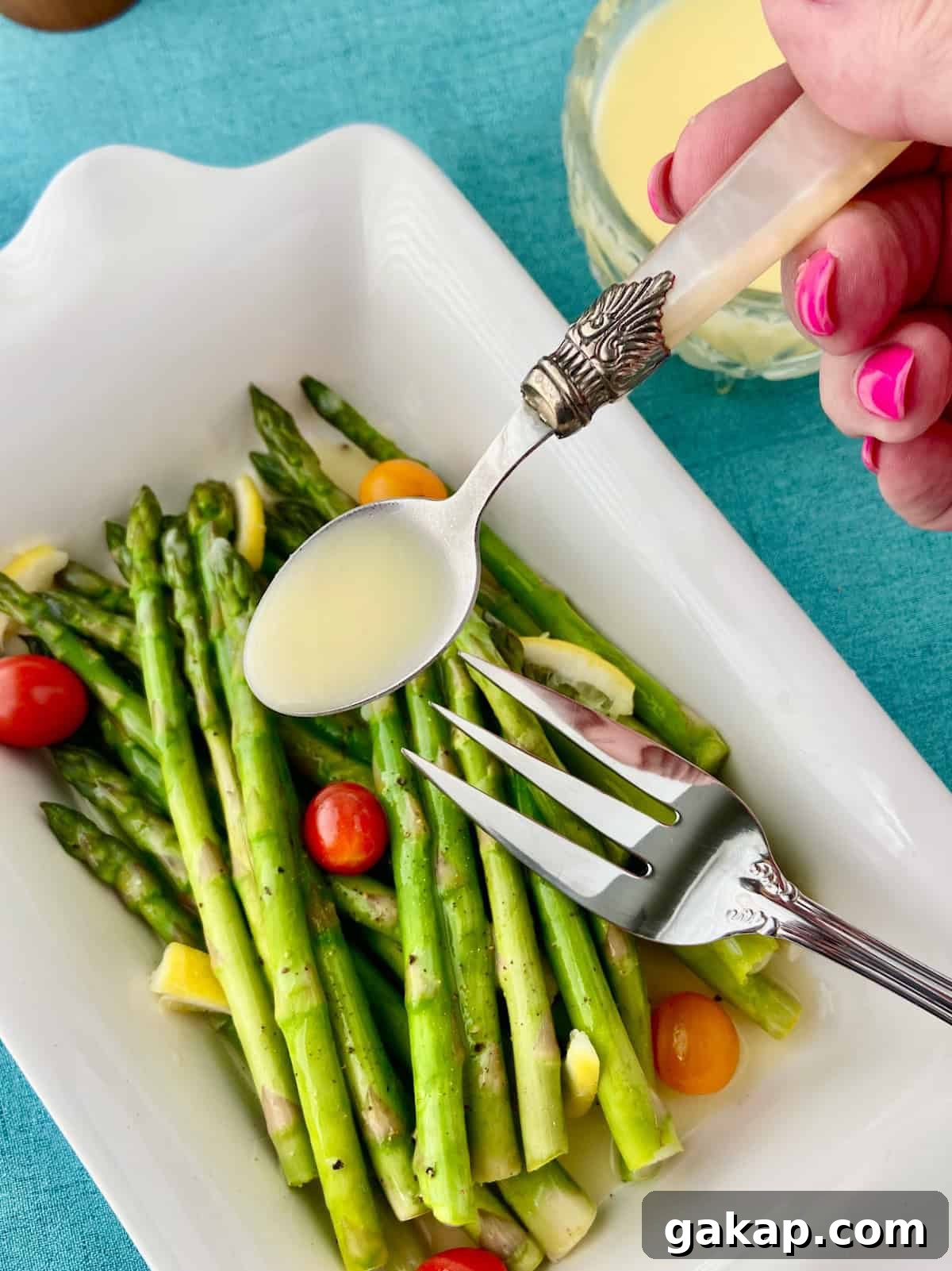 Quick Lemon Butter Sauce in 5 Minutes for Fish & Pasta 3 Lemon butter sauce on serving spoon.