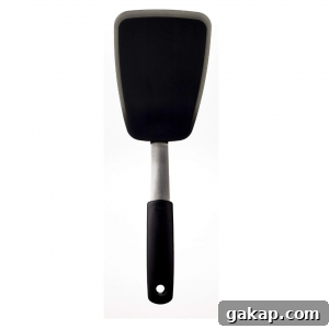 large black silicone flipper with black handle.