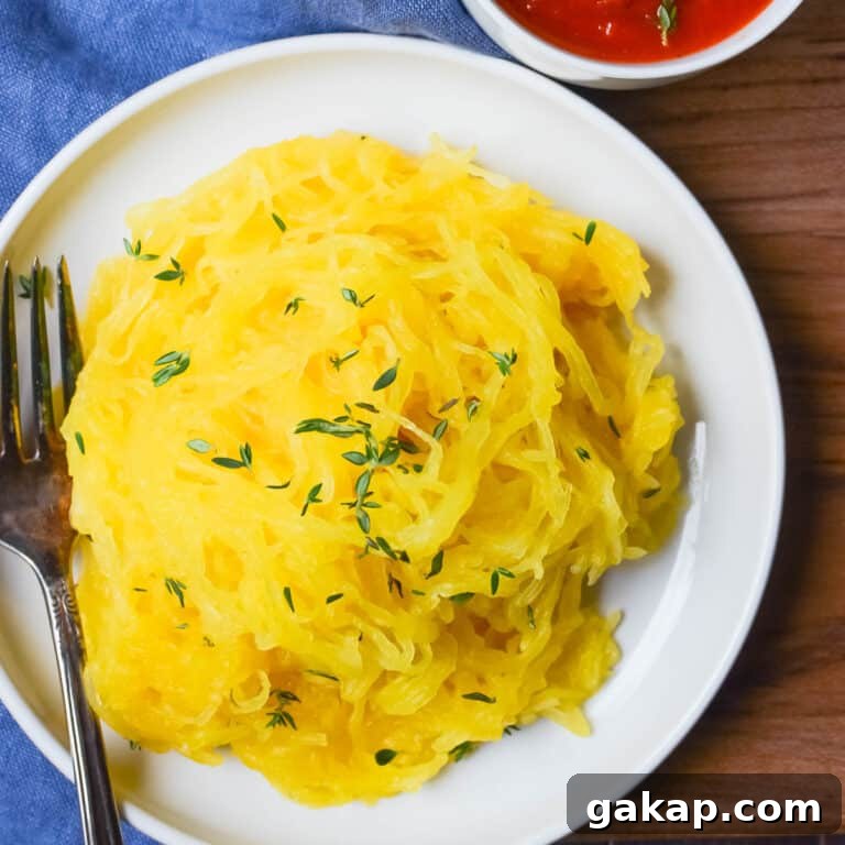 Serving a plate of spaghetti squash with marinara.