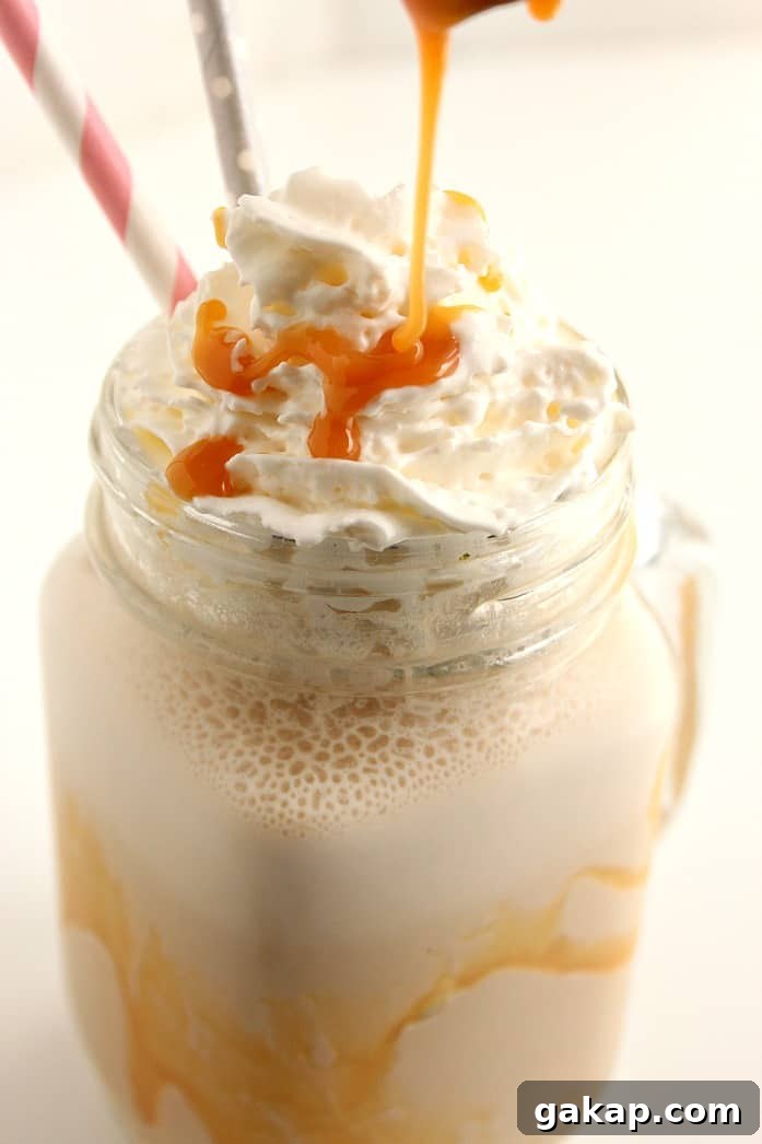 Homemade Salted Caramel Frappuccino Recipe - my favorite coffee shop drink in it's lighter, homemade version. So easy and absolutely delicious! 