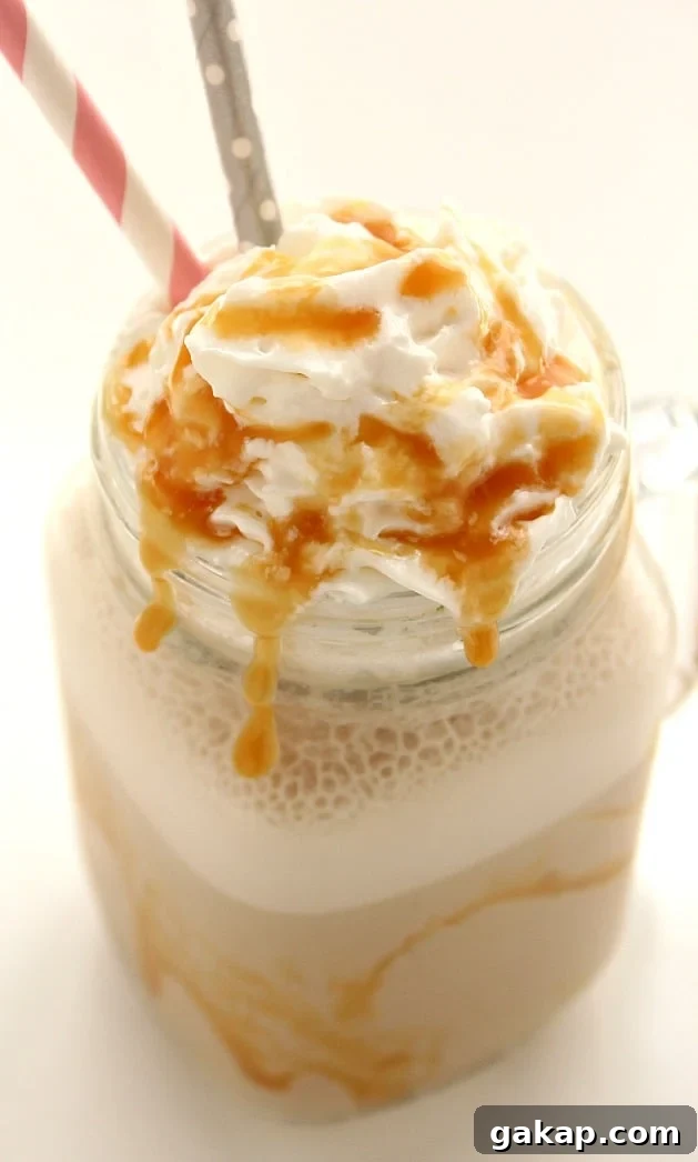 Homemade Salted Caramel Frappuccino Recipe - my favorite coffee shop drink in it's lighter, homemade version. So easy and absolutely delicious! 