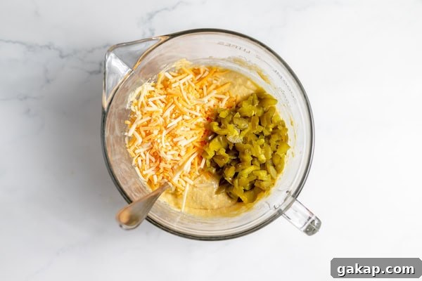 cheese and peppers on cornbread batter