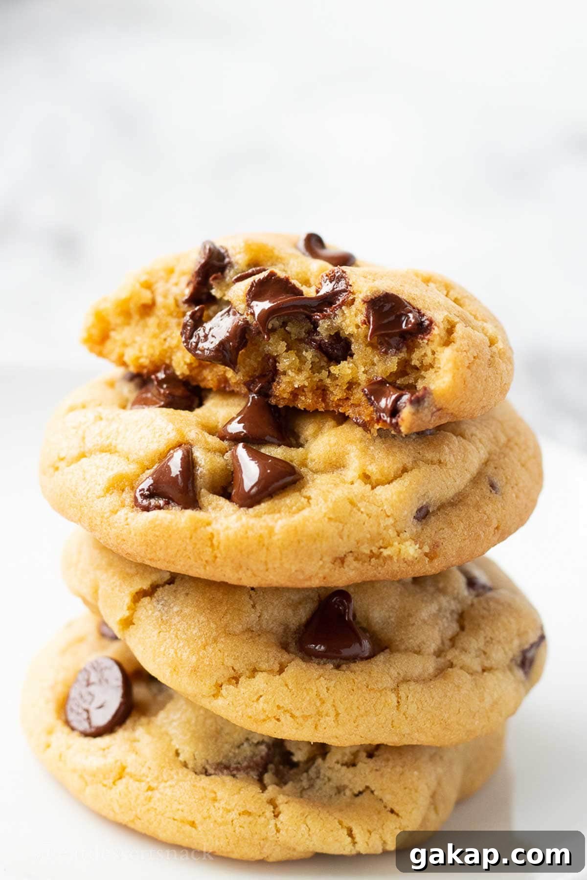 Stack of baked chocolate chip cookies.