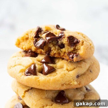 Stacked baked chocolate chip vanilla pudding cookies.