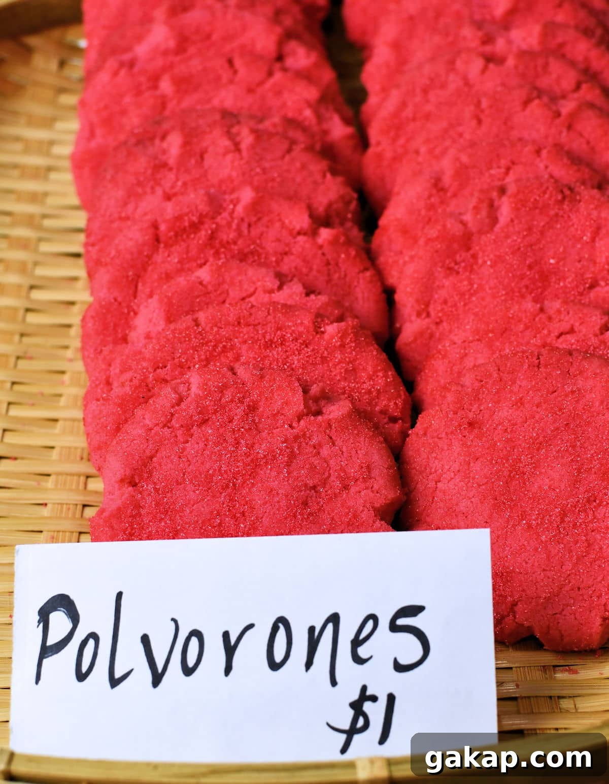 Mexican Pink Polvorones (Dye-Free Pink Cookies) 7 a displayed basket of Mexican Pink Cookies with a one dollar price polvorones rosas