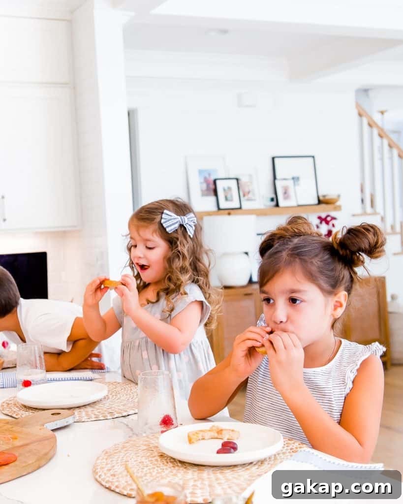girls eating at the kitchen counter
