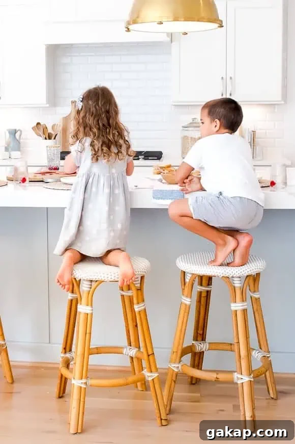 kid friendly counter stools with children sitting on them 