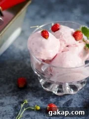 Strawberry Frozen Yogurt in a bowl with spoons