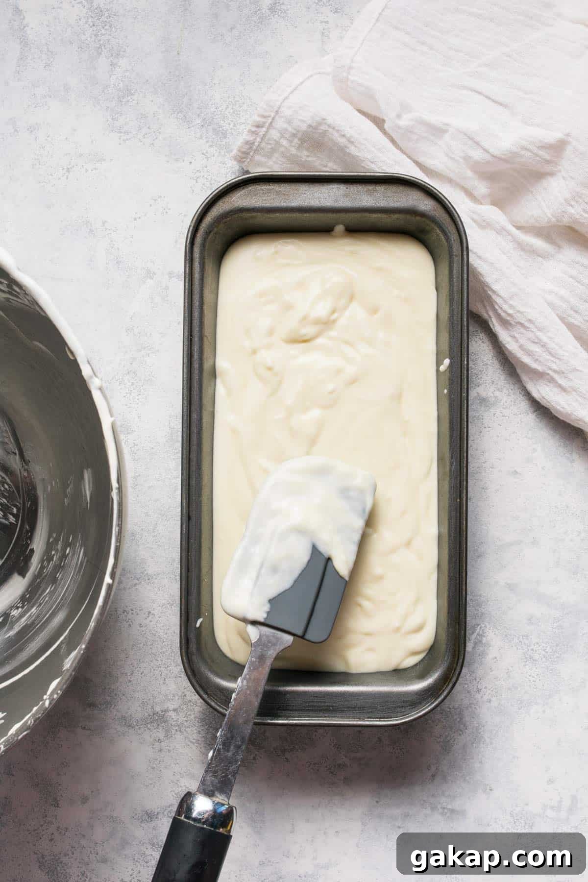 No-Churn Margarita Ice Cream: Creamy Lime & Tequila Recipe 6 Tequila-infused no-churn ice cream in a container ready for freezing.