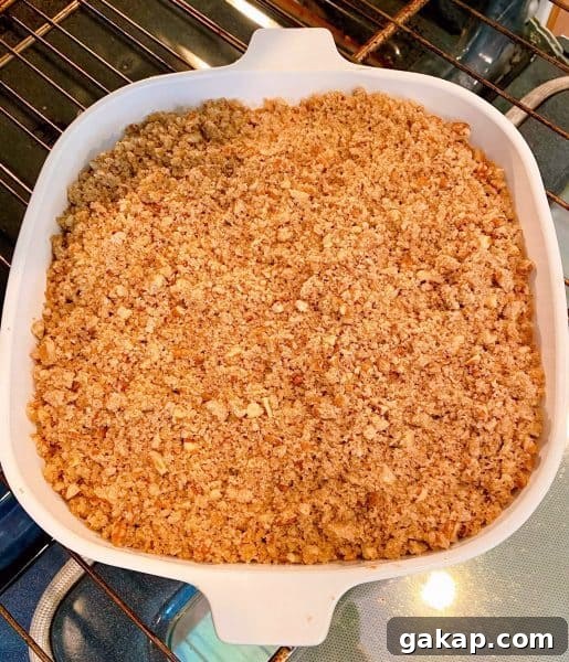 Southern Sweet Potato Casserole with Pecan Streusel 8 sweet potato casserole with the crumb topping sprinkled all over the top.