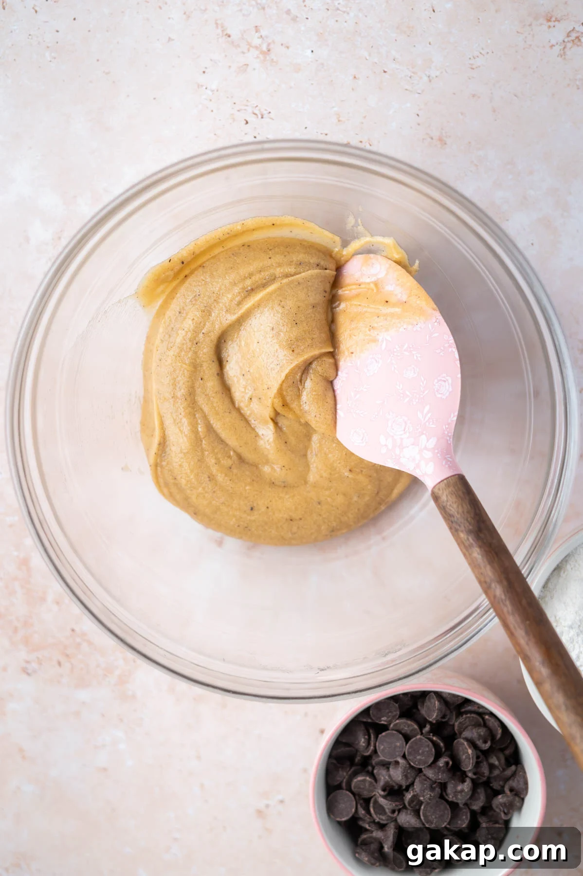Crispy Thin Chocolate Chip Cookies: Crunchy, Perfectly Baked 7 cookie dough in a bowl with a spatula before the flour is added