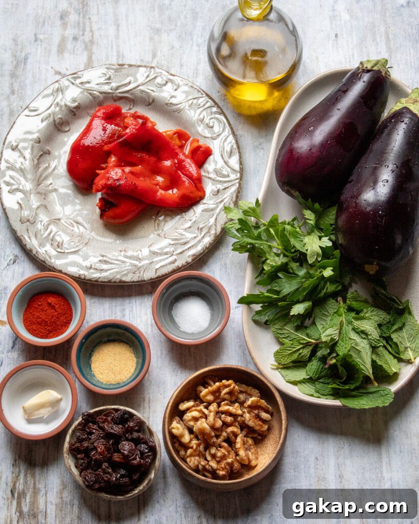 ingredients laid out in small bowls for eggplant salad