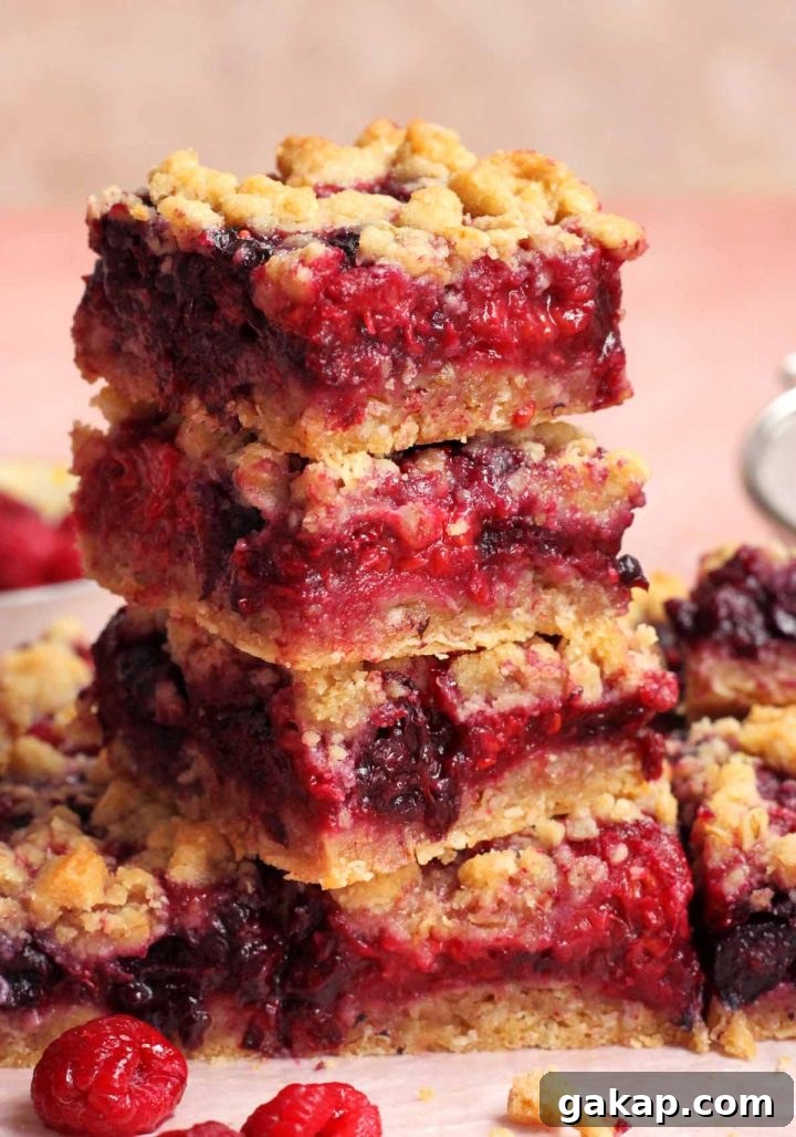 stack of mixed berry crumble bars