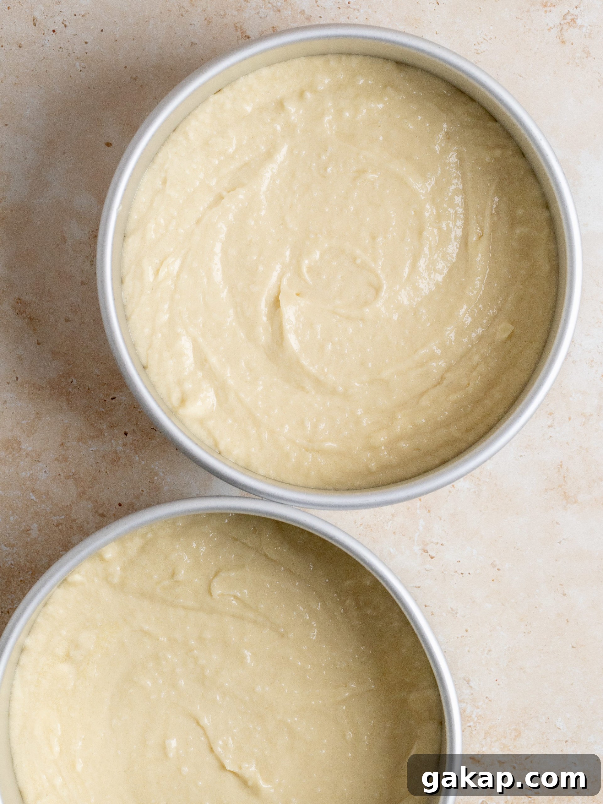 Cake batter in pans