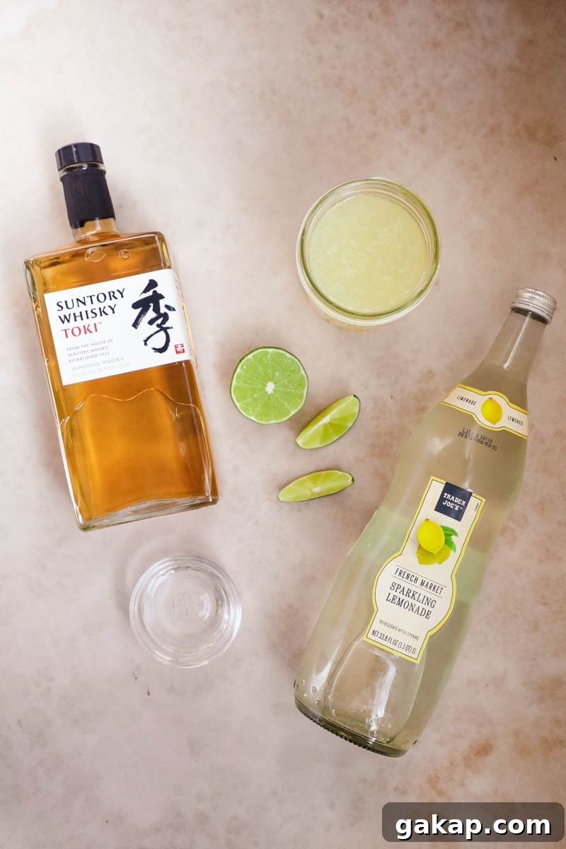 Ingredients to make a green tea shot, including whisky, sparkling lemonade, sweet and sour mix, and peach schnapps.