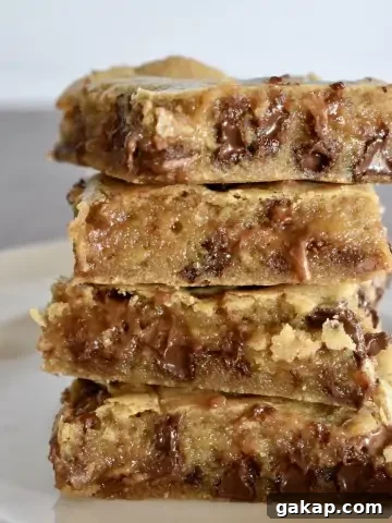 Milky Way Blondies stacked on top of each other.