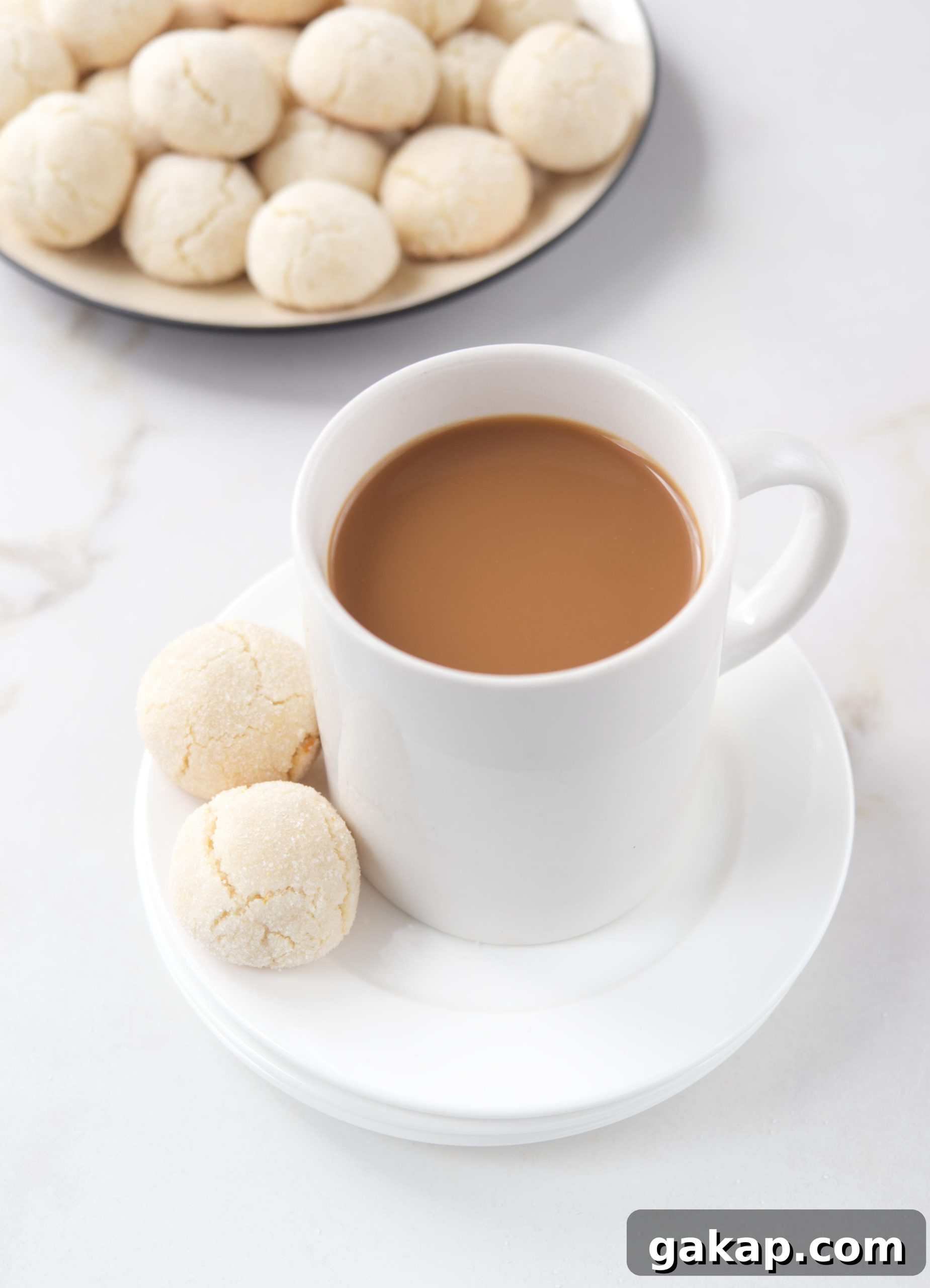 Cup of coffee with amaretti cookies.