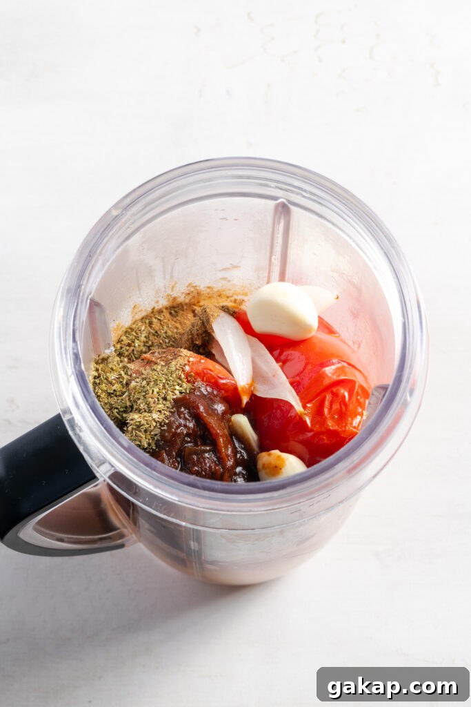 chicken taco sauce ingredients added to a blender.