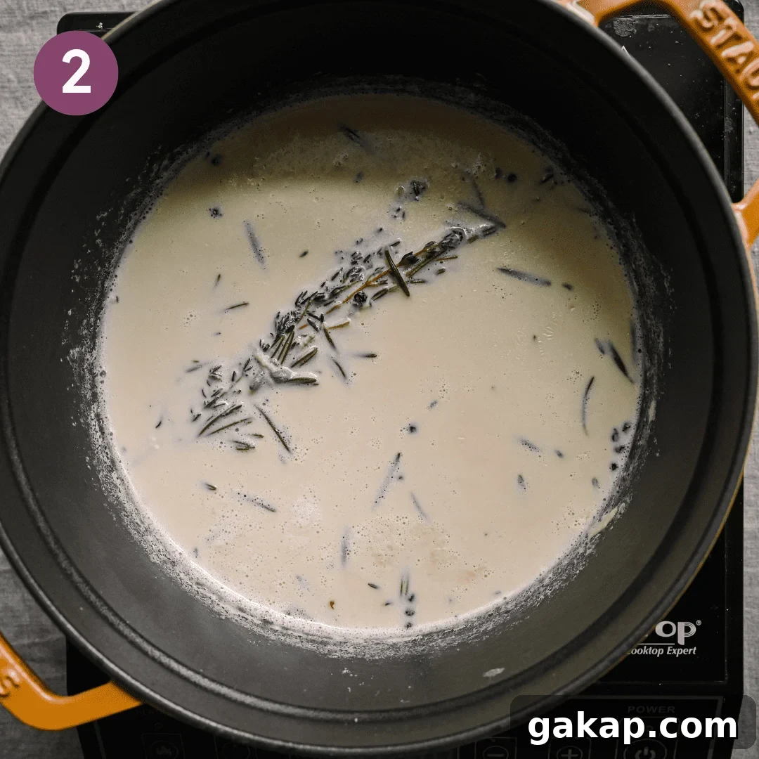 herb infused milk in a saucepan