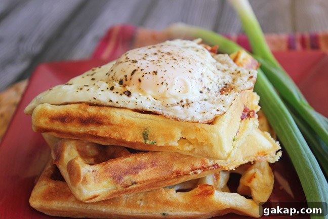 Waffles topped with runny egg