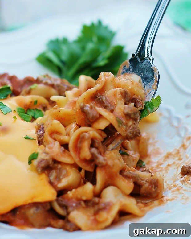 A forkful of Cheesy Beef Noodle Casserole