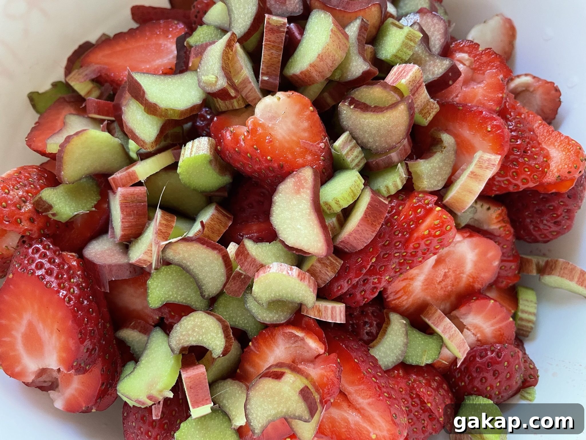 Sliced ripe strawberries and rhubarb.