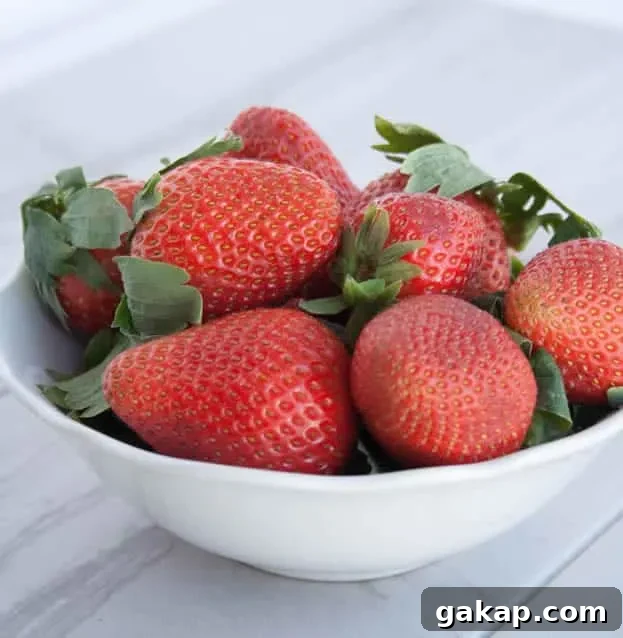 Decadent Strawberry Layer Cake Recipe with Fresh Berries 4 strawberry-cake-06-rev