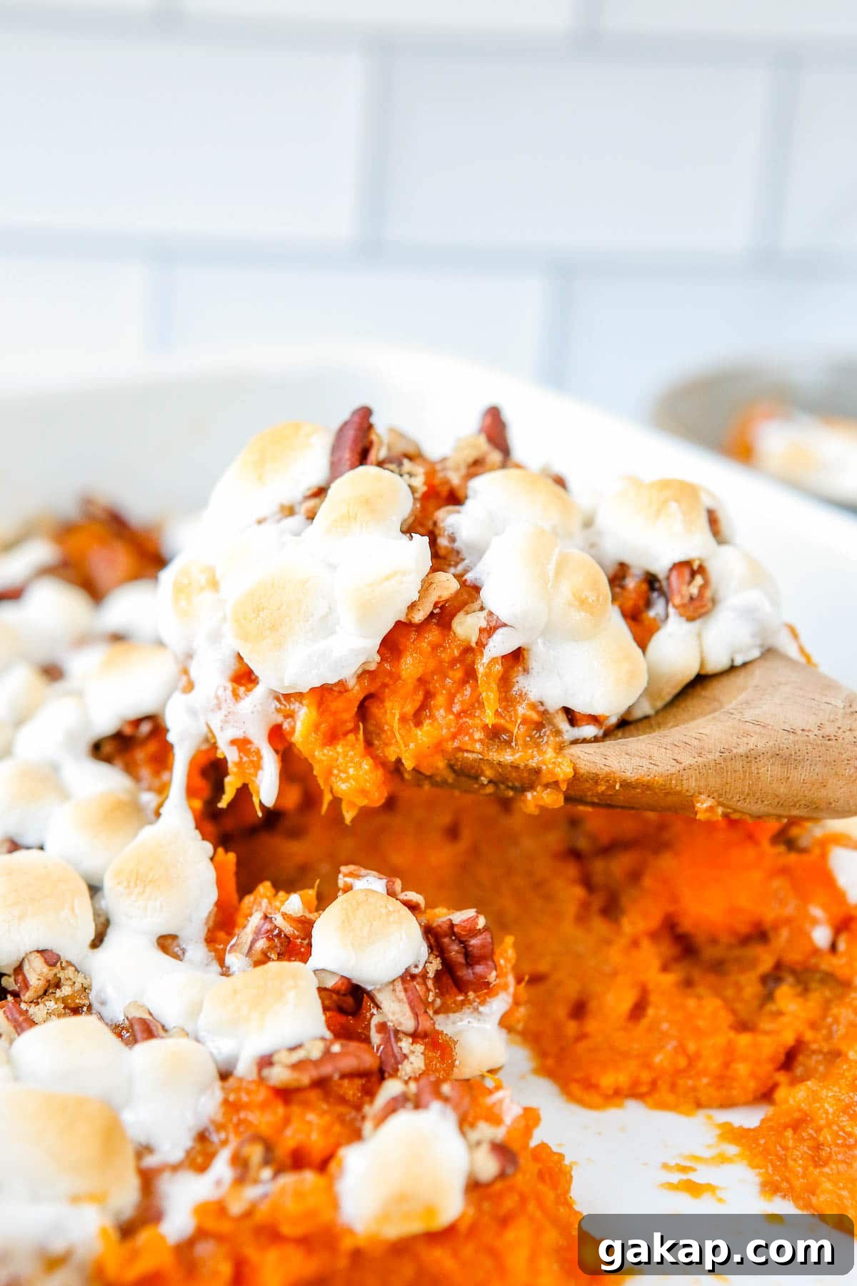 a scoop of sweet potato casserole. 