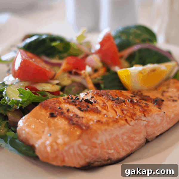 Fresh baked salmon with lettuce salad