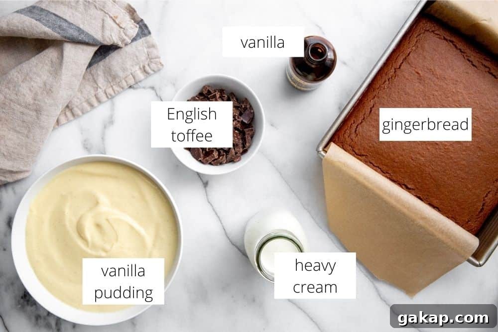 Gluten-Free Gingerbread Trifle Recipe — Festive Holiday Dessert 5 The ingredients for the gingerbread trifle recipe arranged on a marble surface with labels.