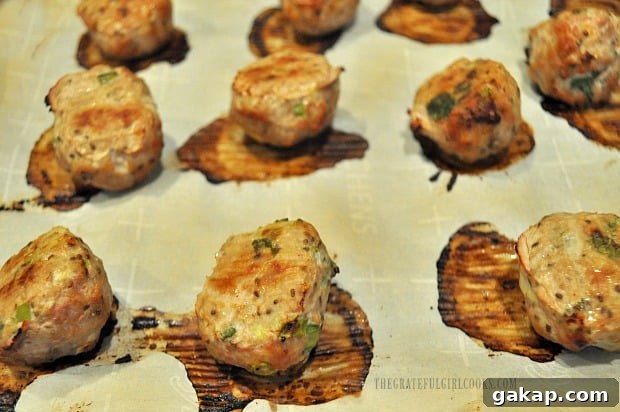 When the Thai turkey meatballs are done baking, they will be golden brown.