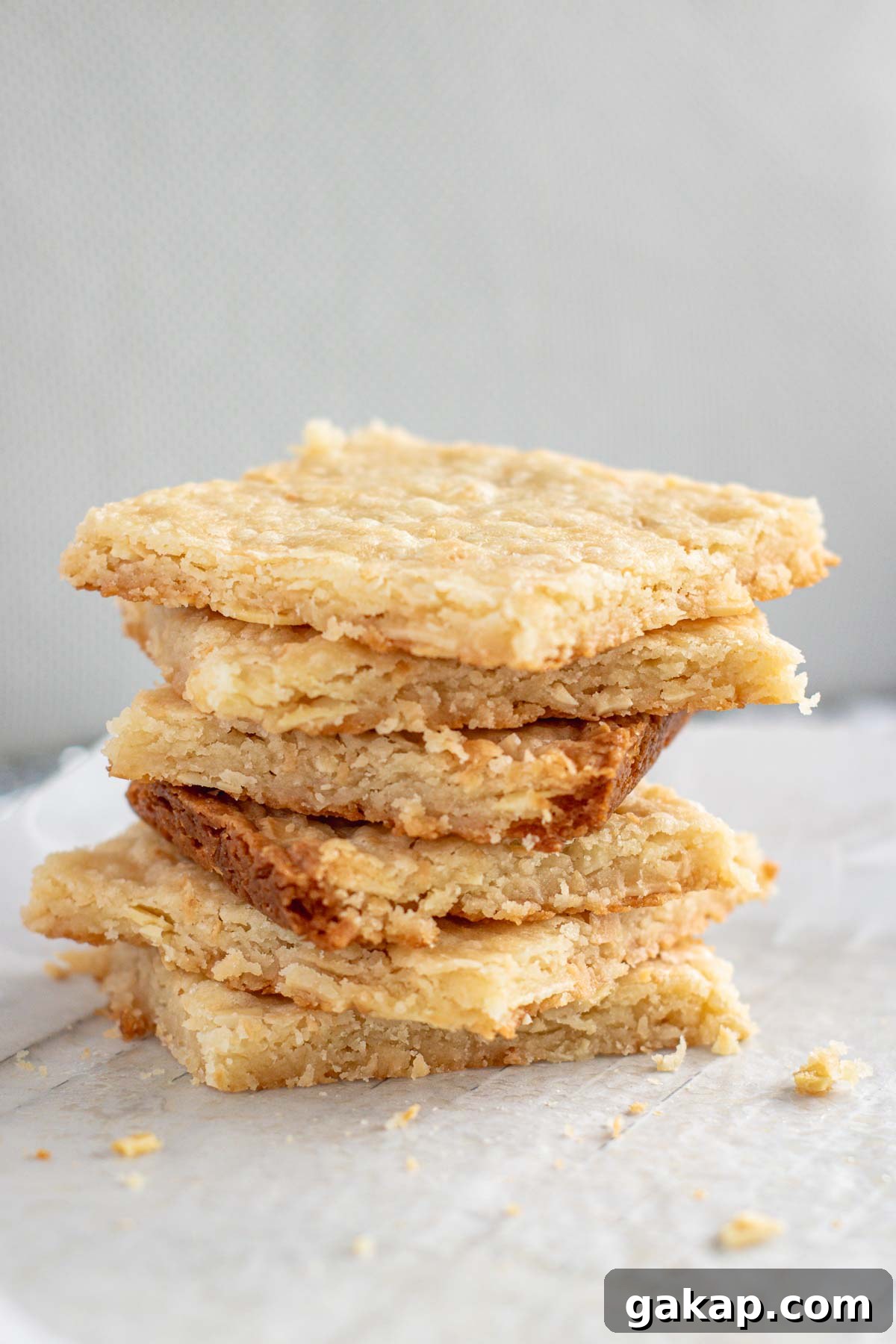 Almond Coconut Shortbread Bars Recipe with Crispy Coconut Crust 4 Almond coconut shortbread bars.