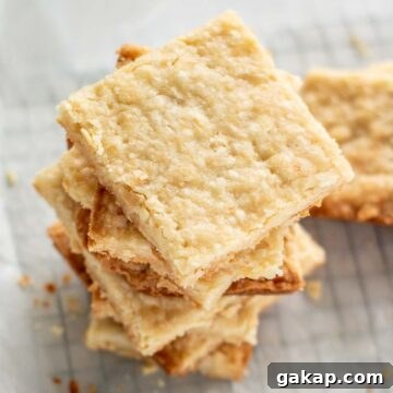 Almond Coconut Shortbread Bars Recipe with Crispy Coconut Crust 5 Almond coconut shortbread cookie bars.