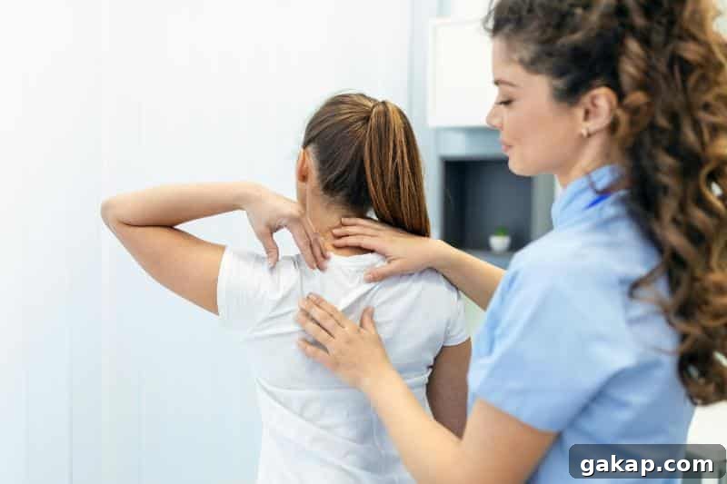 6 Effective Treatments for Long‑Lasting Shoulder Pain 2 physical therapist massaging woman's shoulder