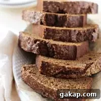 Moist and fluffy healthy maple gingerbread loaf! With whole wheat flour, applesauce and plenty of warm spice! Perfect for snacking or dessert!