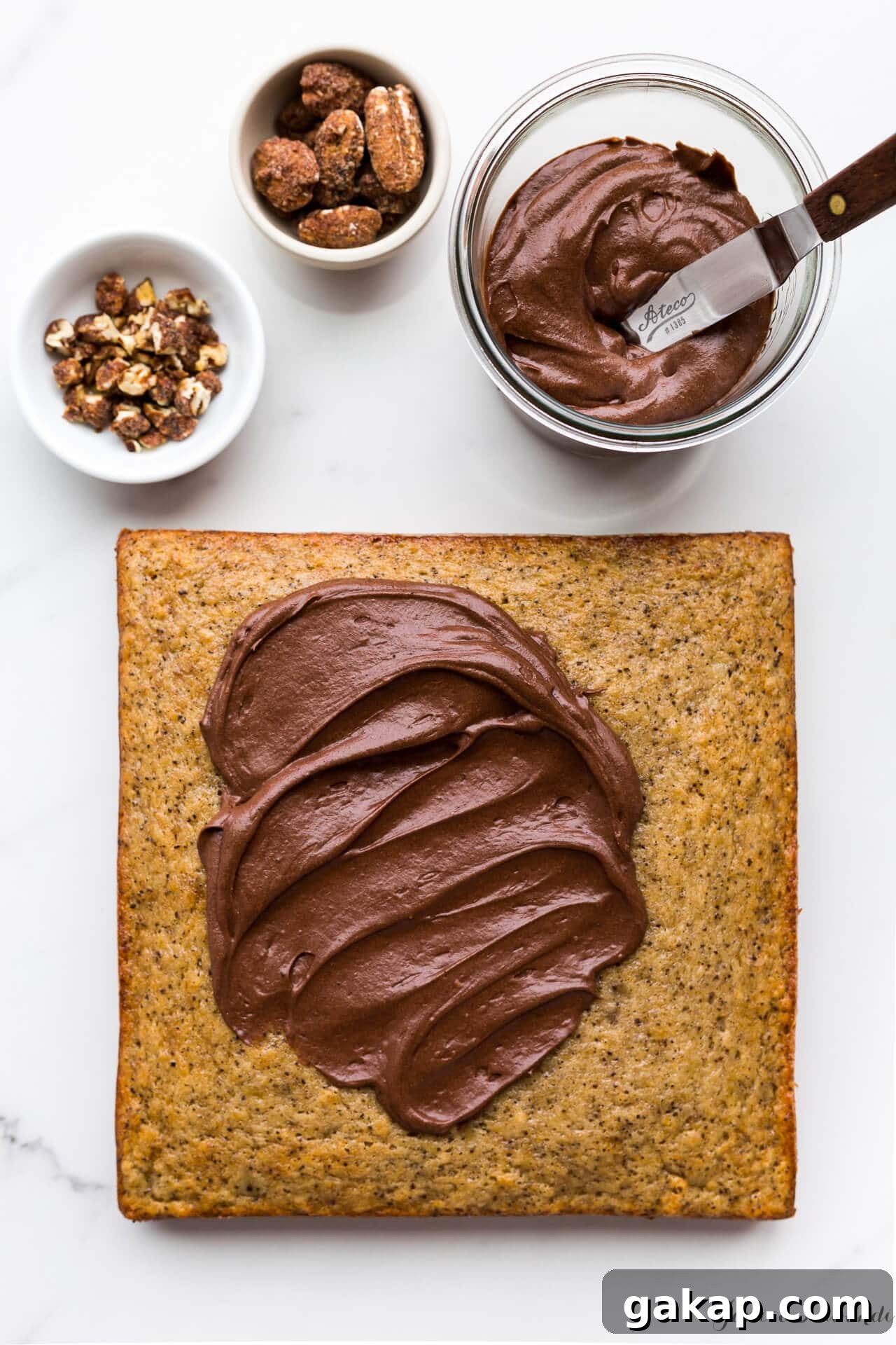 Coffee banana cake flavoured with coffee and topped with milk chocolate frosting
