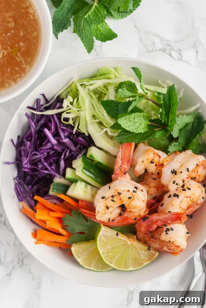 A top down view of a bowl of Vietnamese shrimp salad.